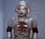 Twiki carrying Dr Theopolis